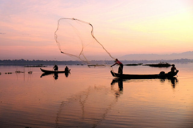 silueta de pescador